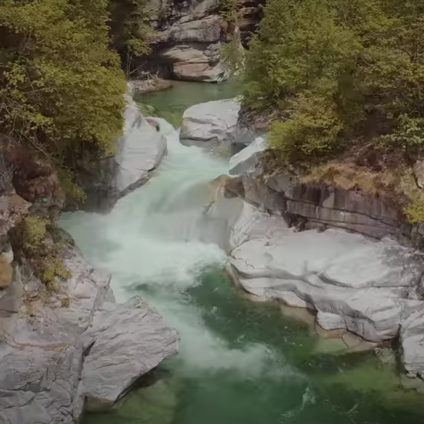 little waterfall in the middle of a wood